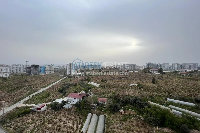 Приобрести Квартира в Махмутларе с мебелью, видом на горы в жилом комплексе 21 