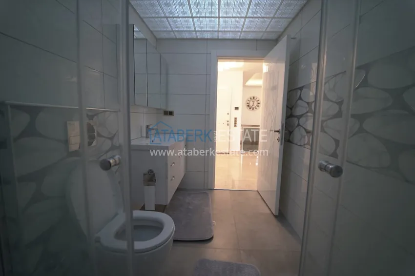 Приобрести Дуплекс в Махмутларе с мебелью и застекленным балконом в благоустроенной резиденции 22 