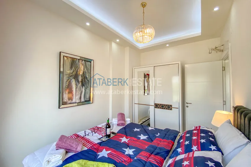 Приобрести Садовый дуплекс в Алании – район Оба с чистовой отделкой и новой мебелью 32 