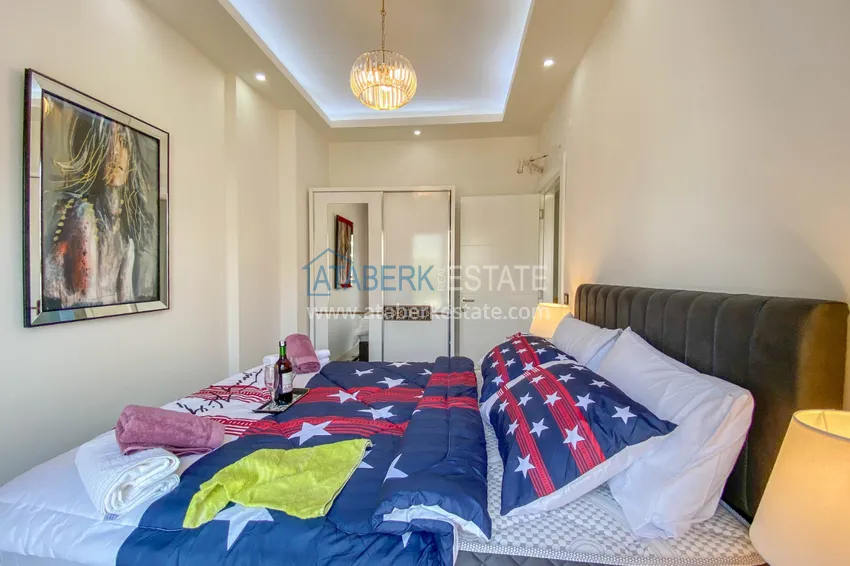 Приобрести Садовый дуплекс в Алании – район Оба с чистовой отделкой и новой мебелью 33 