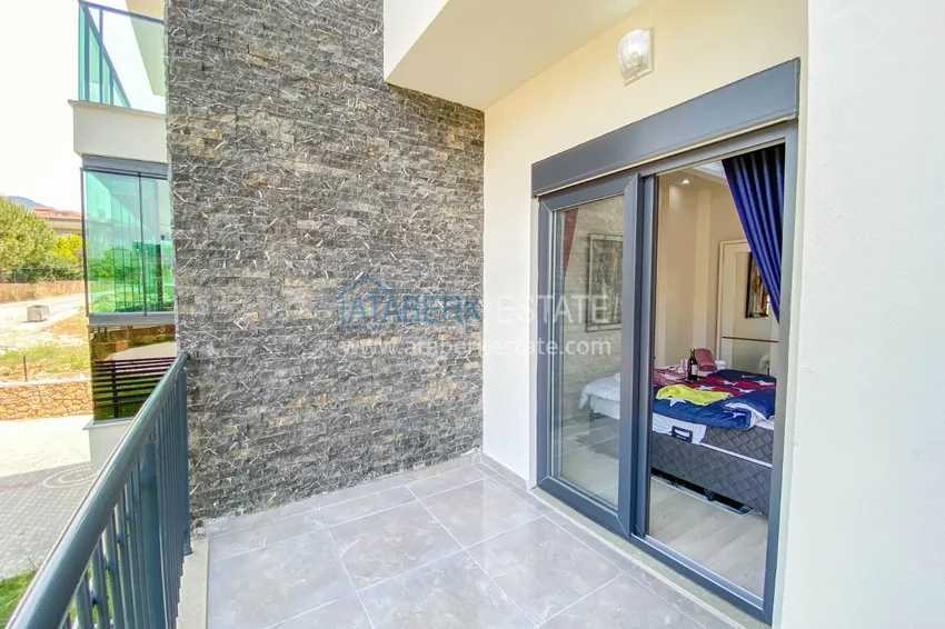 Приобрести Садовый дуплекс в Алании – район Оба с чистовой отделкой и новой мебелью 34 