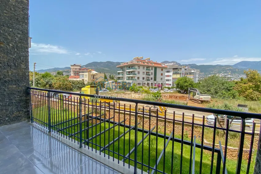 Приобрести Садовый дуплекс в Алании – район Оба с чистовой отделкой и новой мебелью 36 