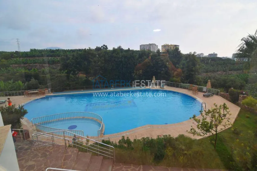 Квартира в Махмутларе с мебелью, видом на горы в жилом комплексе 4 