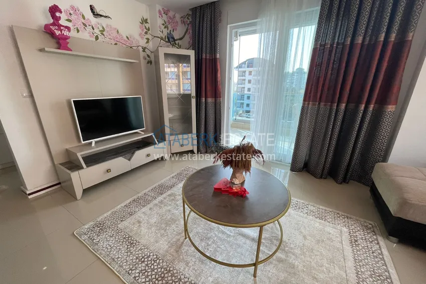 Приобрести Квартира с мебелью и застекленным балконом в Махмутларе 4 