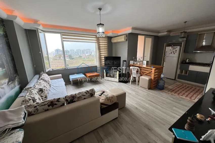 Приобрести Квартира в Махмутларе с мебелью, видом на горы в жилом комплексе 3 