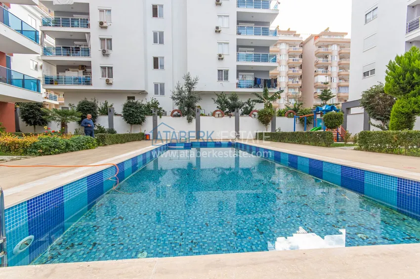 Квартира с мебелью и застекленным балконом в Махмутларе 4 