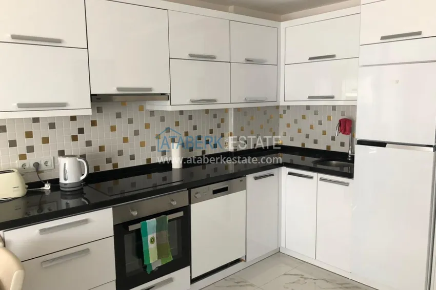 Приобрести Квартира в Авсалларе с мебелью в элитном комплексе у пляжа Инджекум 3 