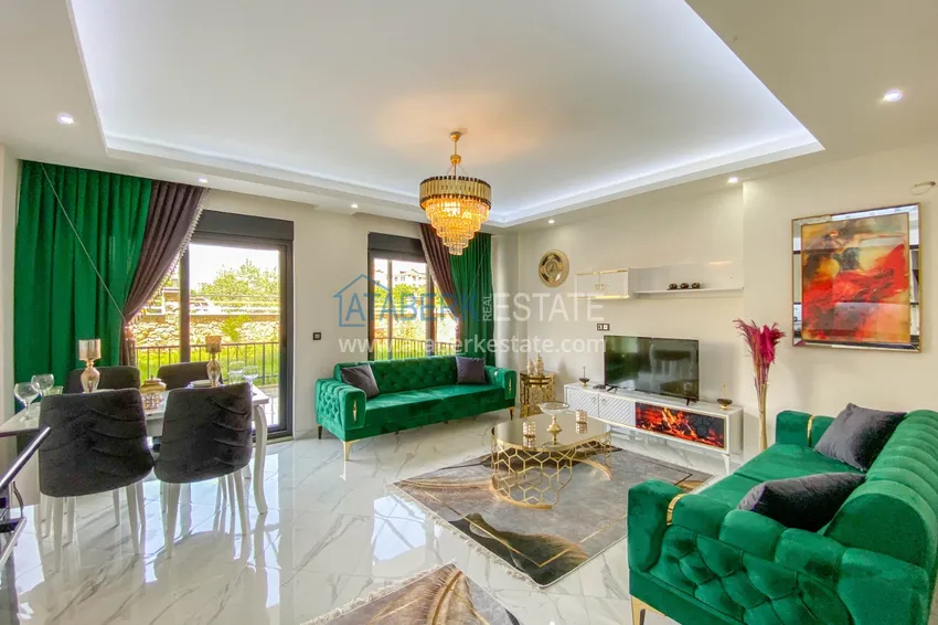 Приобрести Садовый дуплекс в Алании – район Оба с чистовой отделкой и новой мебелью 4 