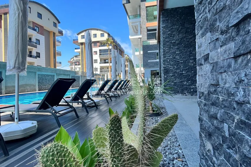 Квартира в Алании – район Оба с высококачественной чистовой отделкой и отдельной кухней  4 