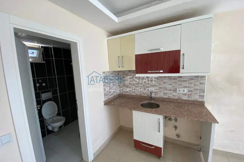 Приобрести Квартира-студия в Махмутларе в уютном комплексе рядом с морем 4 