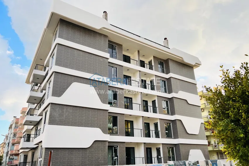 Квартиры в центре Алании двухкомнатные с чистовой отделкой в молодом современном комплексе  4 