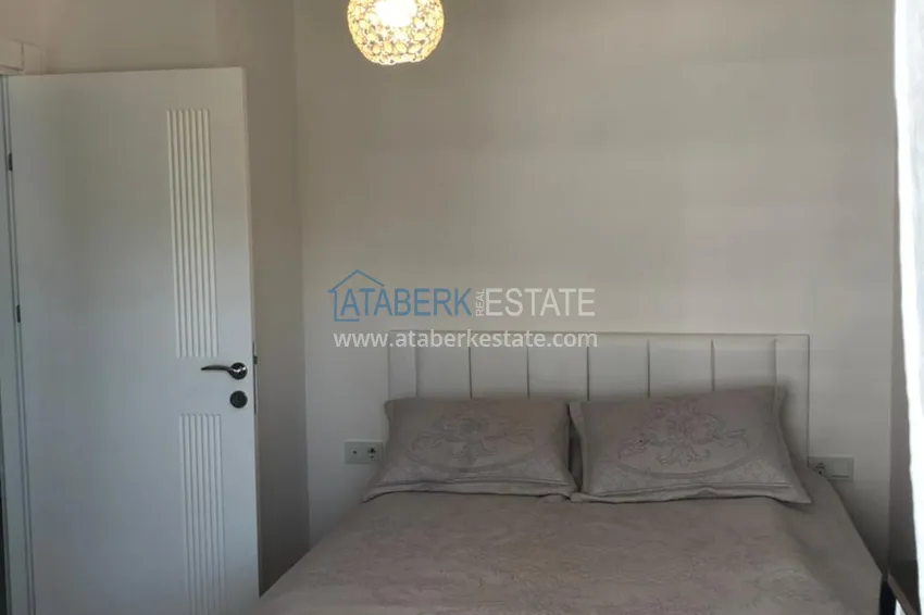 Приобрести Квартира в Авсалларе с мебелью в элитном комплексе у пляжа Инджекум 5 