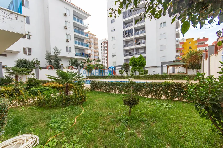 Квартира с мебелью и застекленным балконом в Махмутларе 6 