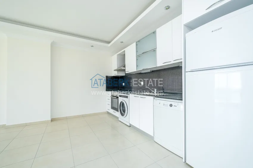 Приобрести Квартира двухкомнатная с видом на море в комплексе с частным пляжем в Авсалларе 5 