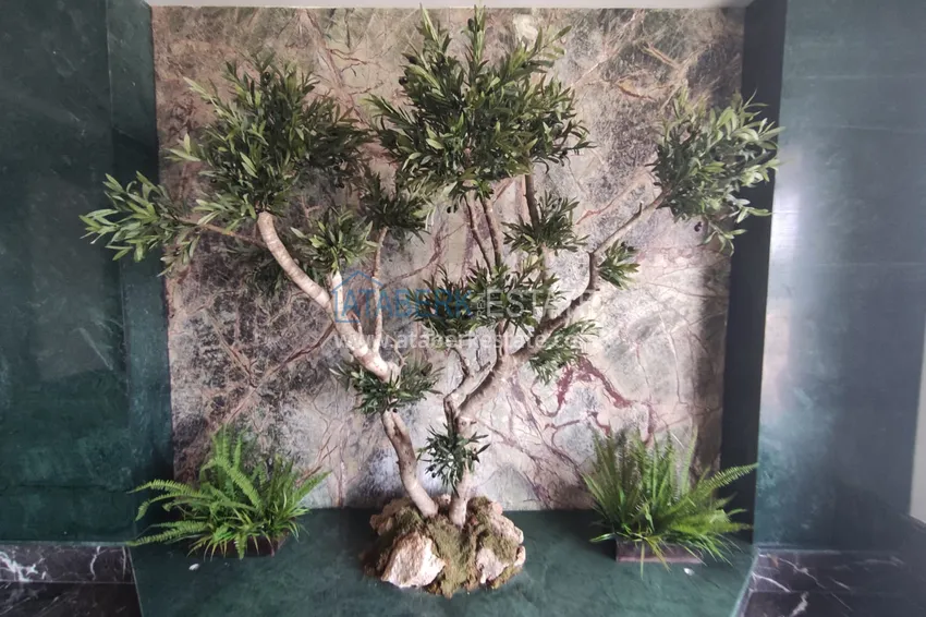 Квартира в Махмутларе со стильным интерьером, отдельной кухней и видом на море 9 