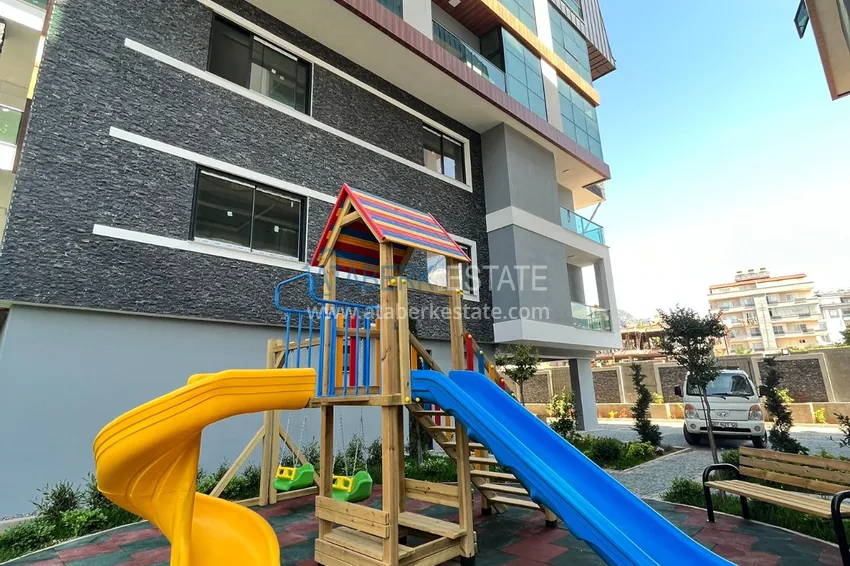 Квартира в Алании – район Оба с высококачественной чистовой отделкой и отдельной кухней  6 