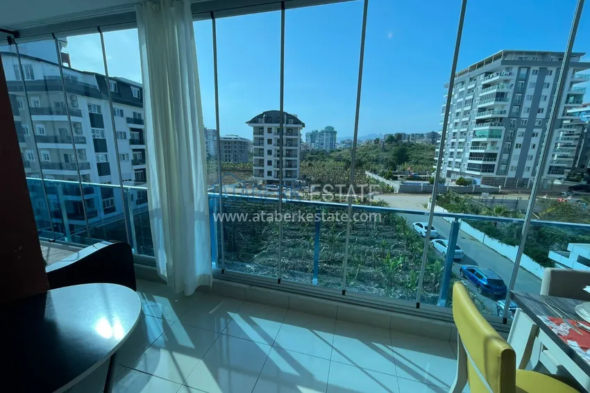 Приобрести Квартира с мебелью и застекленным балконом в Махмутларе 6 