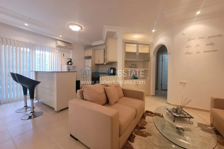 Приобрести Квартира в Алании - район Тосмур, трехкомнатная с мебелью в уютном комплексе 7 