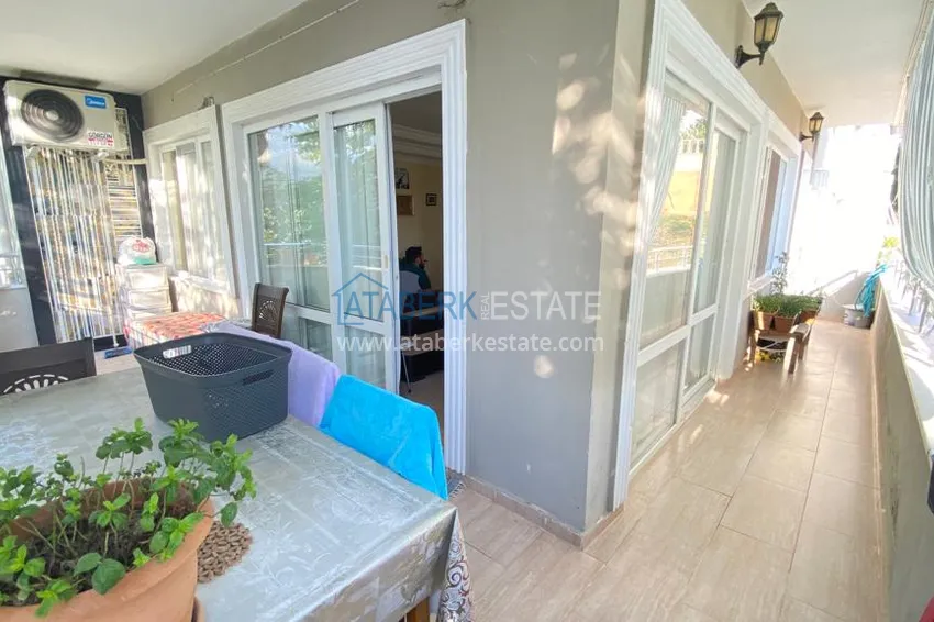 Приобрести Квартира в Махмутларе с мебелью и видом на горы с хорошо продуманной планировкой в комплексе городского типа 8 