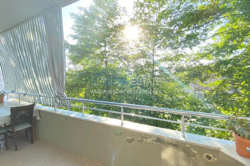 Приобрести Квартира в Махмутларе с мебелью и видом на горы с хорошо продуманной планировкой в комплексе городского типа 9 