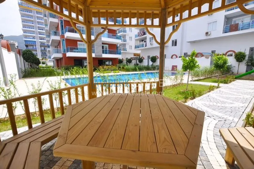 Квартира с мебелью и застекленным балконом в Махмутларе 8 