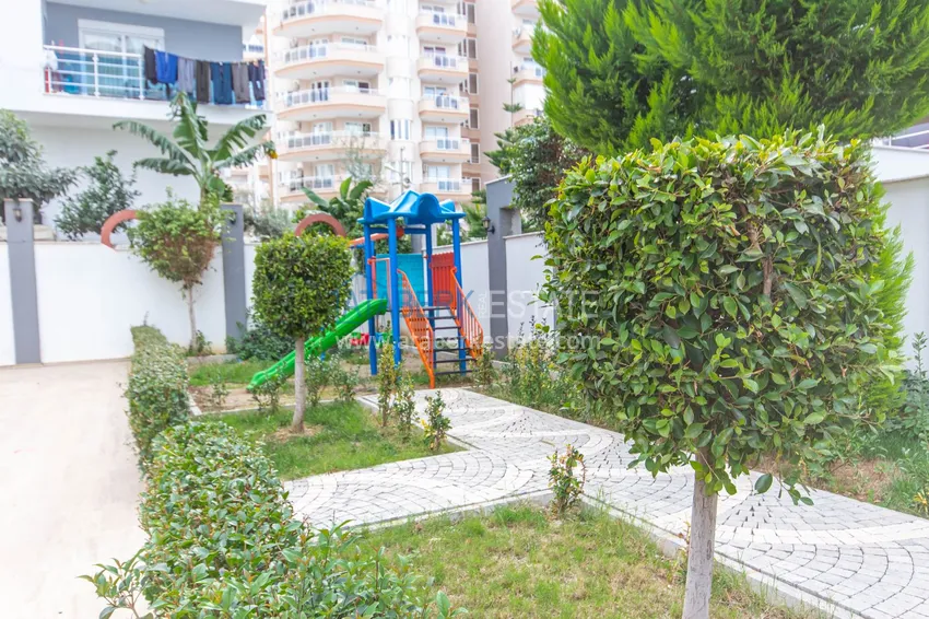 Квартира с мебелью и застекленным балконом в Махмутларе 10 