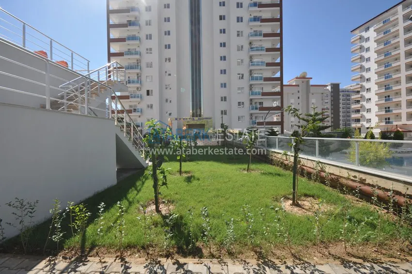 Дуплекс в Махмутларе с мебелью и застекленным балконом в благоустроенной резиденции 12 