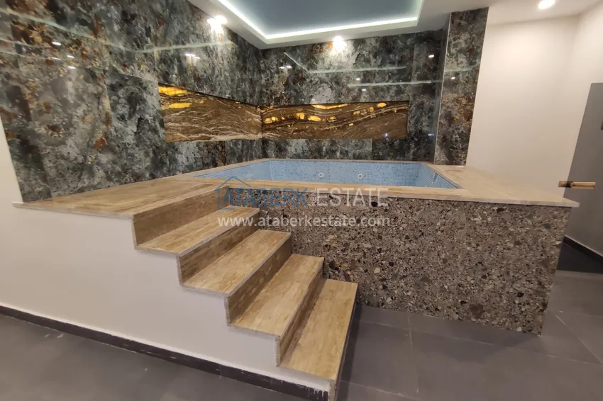 Квартира в Махмутларе со стильным интерьером, отдельной кухней и видом на море 12 