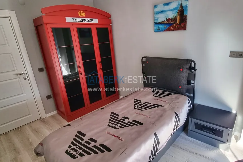 Приобрести Квартира в Махмутларе со стильным интерьером, отдельной кухней и видом на море 11 