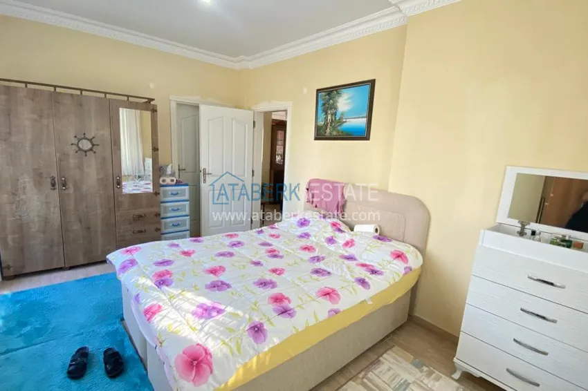 Приобрести Квартира в Махмутларе с мебелью и видом на горы с хорошо продуманной планировкой в комплексе городского типа 13 