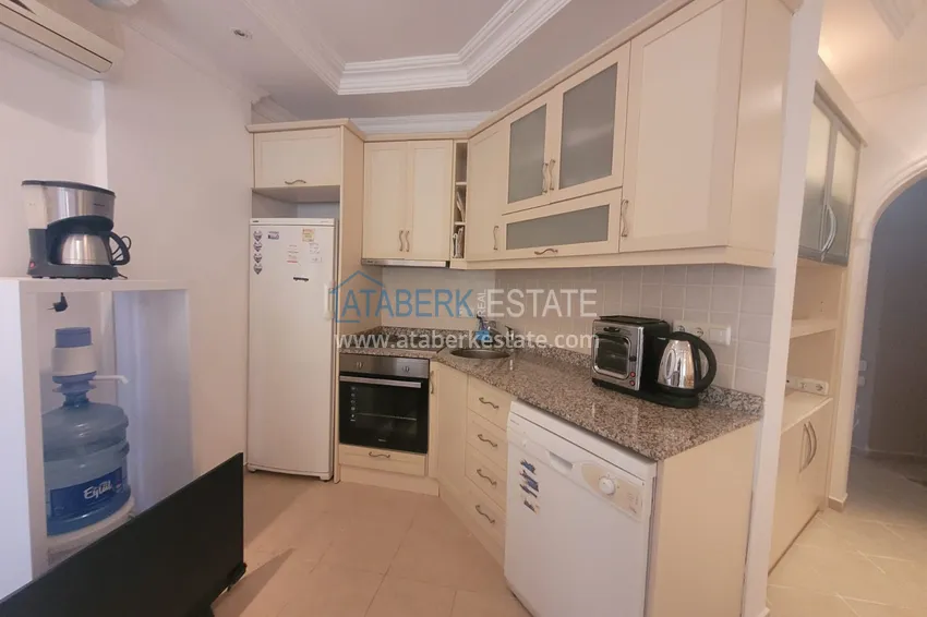 Приобрести Квартира в Алании - район Тосмур, трехкомнатная с мебелью в уютном комплексе 9 