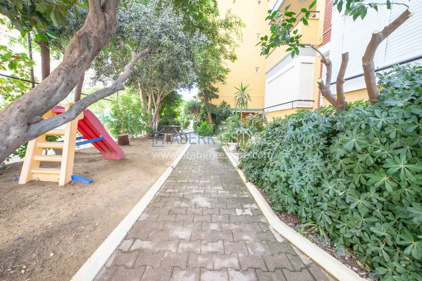 Дуплекс в центре Алании в комплексе с бассейном и видом на горы 11 