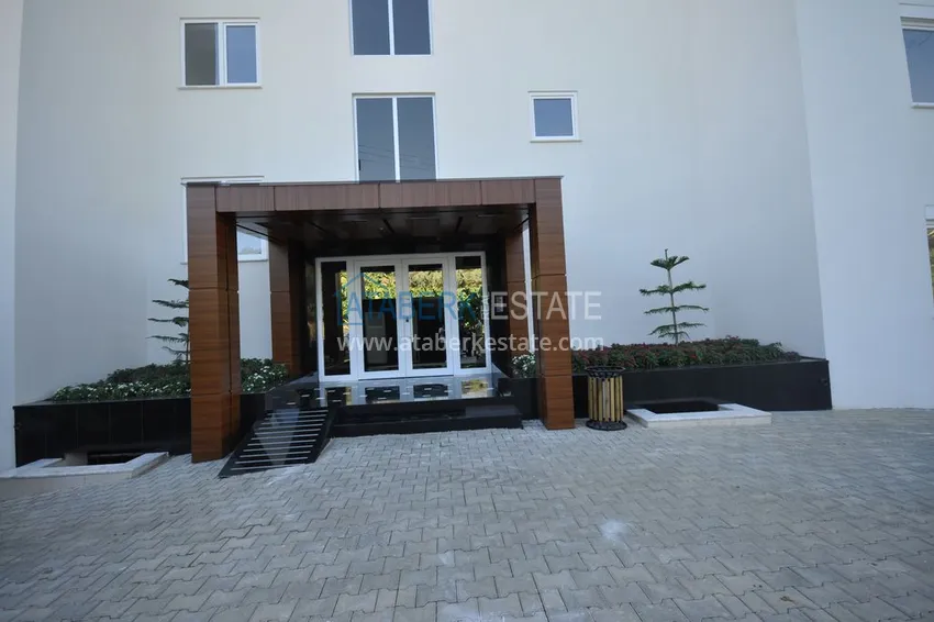 Дуплекс в Махмутларе с мебелью и застекленным балконом в благоустроенной резиденции 14 