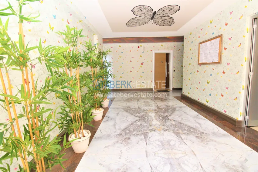 Дуплекс в Махмутларе с мебелью и застекленным балконом в благоустроенной резиденции 16 