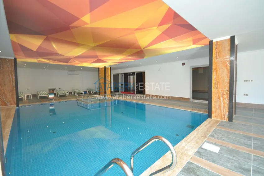 Дуплекс в Махмутларе с мебелью и застекленным балконом в благоустроенной резиденции 17 