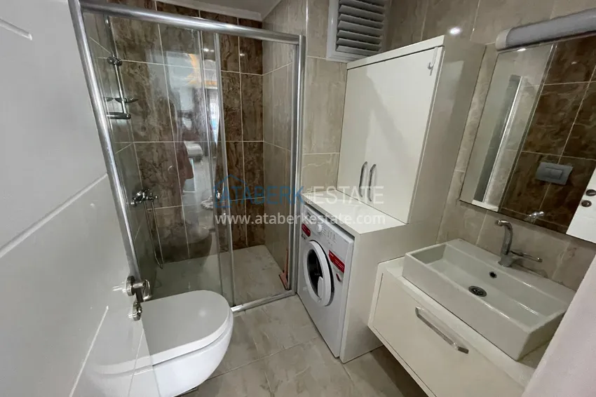 Приобрести Квартира с мебелью и застекленным балконом в Махмутларе 9 