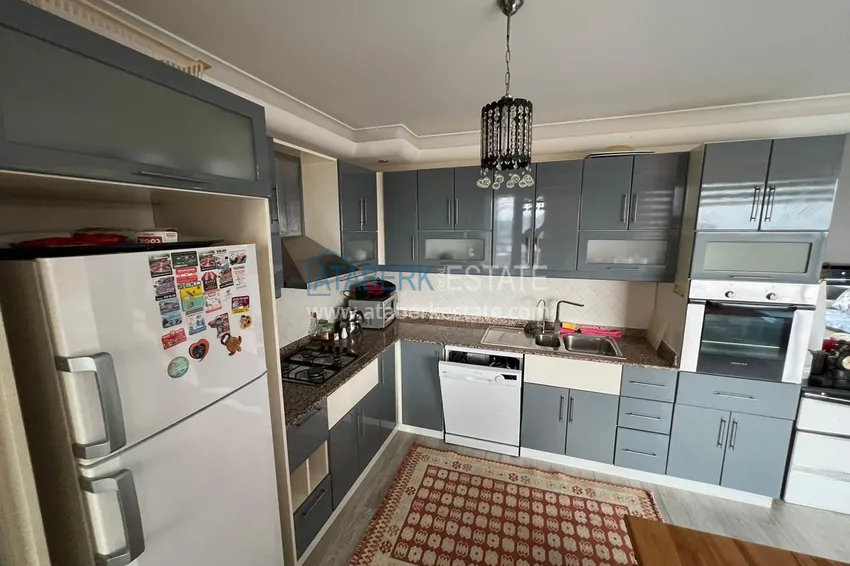 Приобрести Квартира в Махмутларе с мебелью, видом на горы в жилом комплексе 9 