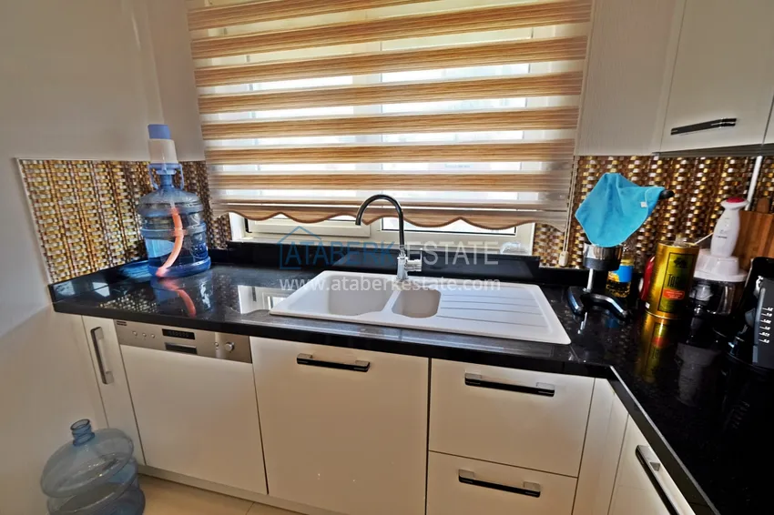 Приобрести Квартира в центре Махмутлара с мебелью и двумя лоджиями 11 