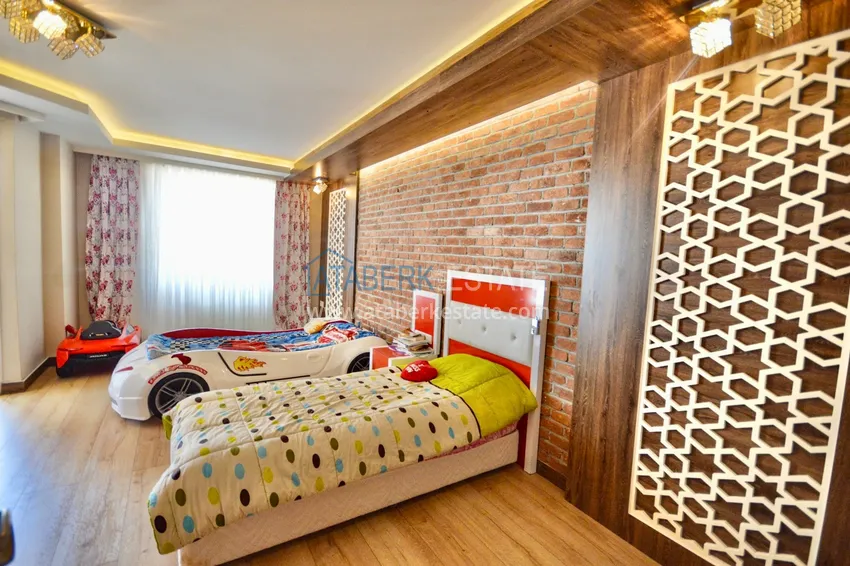 Приобрести Дуплекс в центре Алании в комплексе с бассейном и видом на горы 10 