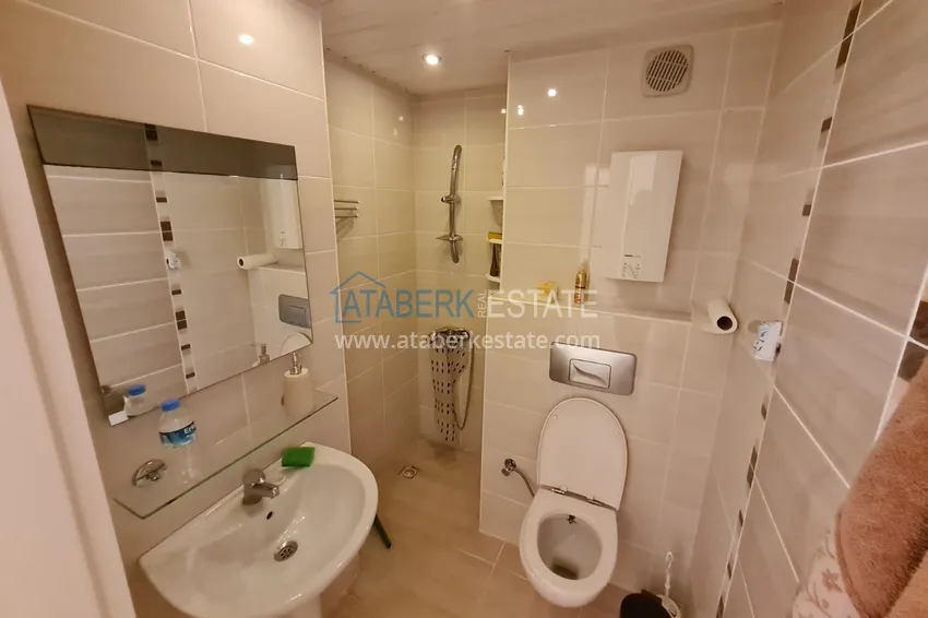 Приобрести Квартира в районе Оба меблированная в современном жилом комплексе 9 