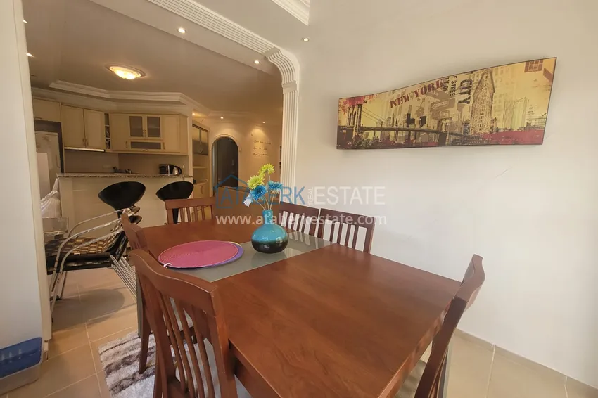 Приобрести Квартира в Алании - район Тосмур, трехкомнатная с мебелью в уютном комплексе 10 