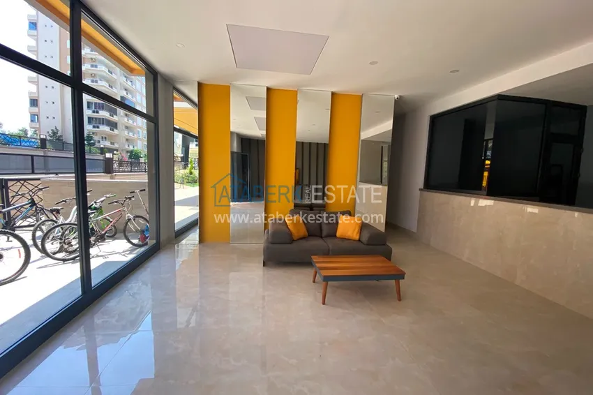 Квартира Махмутларе меблированная с отдельной кухней и частичным видом на море 11 