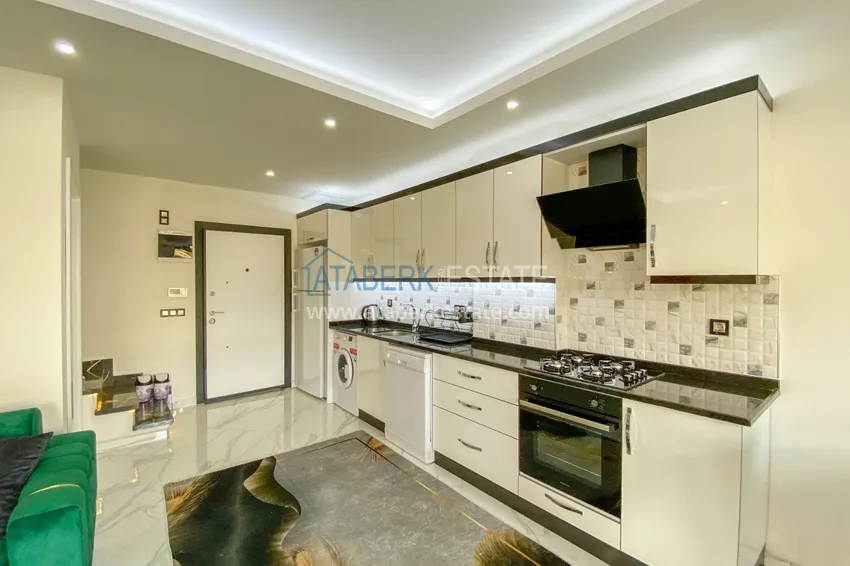 Приобрести Садовый дуплекс в Алании – район Оба с чистовой отделкой и новой мебелью 11 