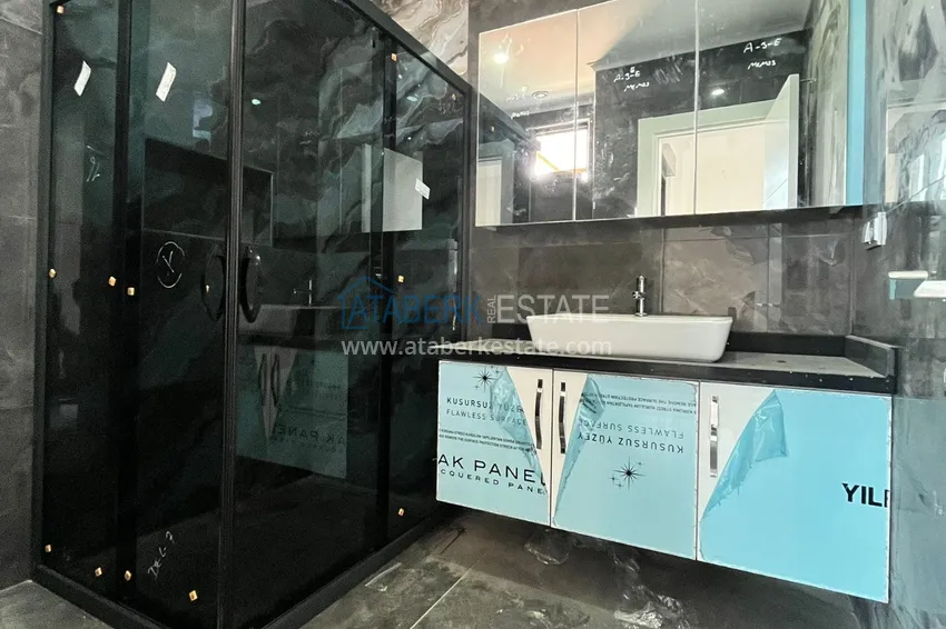 Приобрести Квартира в Алании – район Оба с высококачественной чистовой отделкой и отдельной кухней  9 