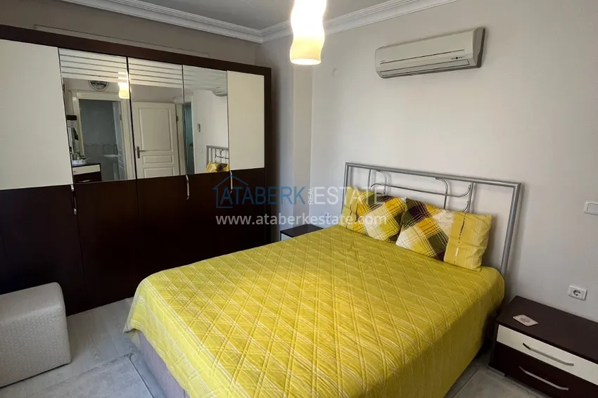 Приобрести Квартира в центре Алании, трехкомнатная с мебелью и отдельной кухней 10 