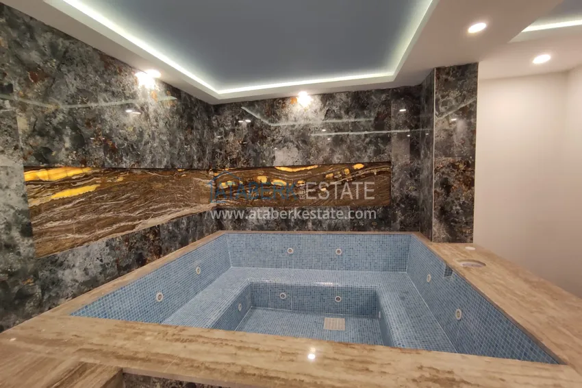 Квартира в Махмутларе со стильным интерьером, отдельной кухней и видом на море 13 