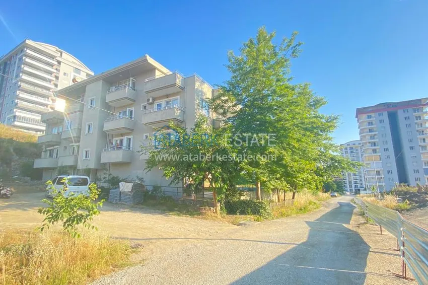 Квартира в Махмутларе с мебелью и видом на горы с хорошо продуманной планировкой в комплексе городского типа 1 