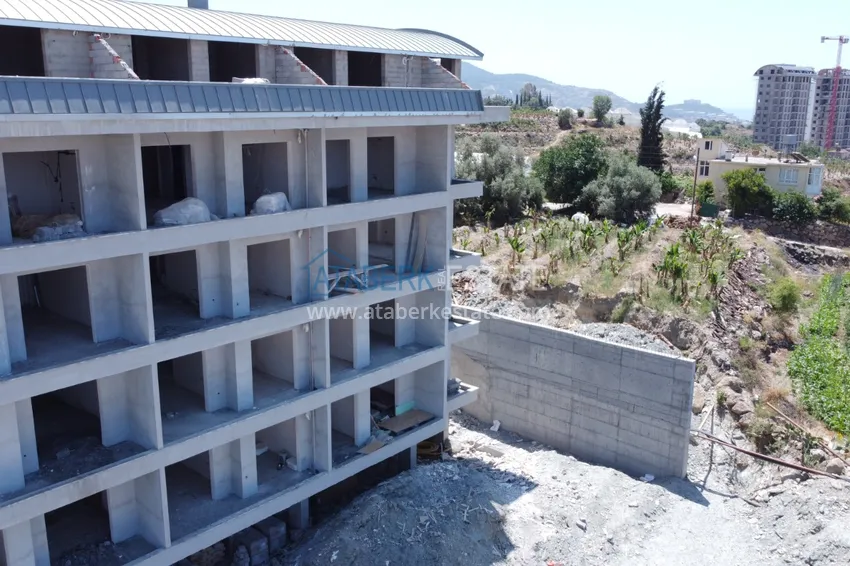 Квартира от инвестора в строящемся жилом комплексе в Махмутларе  13 