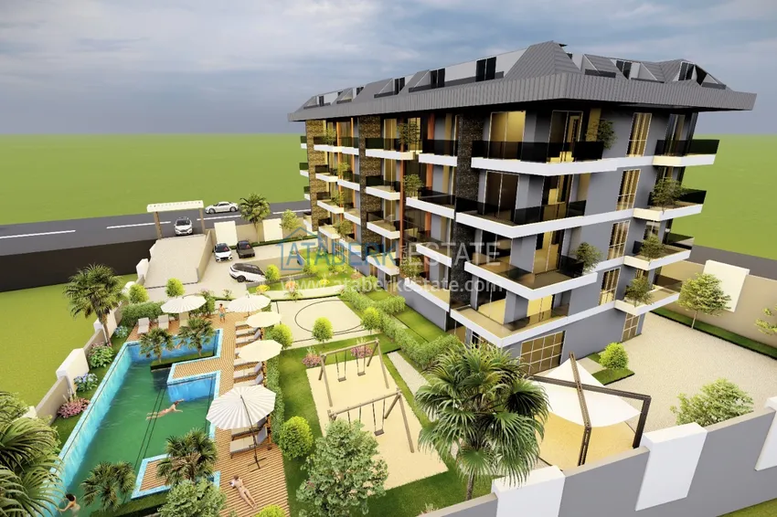 Квартиры в районе Оба в престижном районе Алании от инвестора в строящемся комплексе 1 