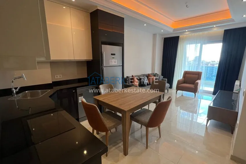 Квартира в Махмутларе с чистовой отделкой, новой мебелью и видом на море 1